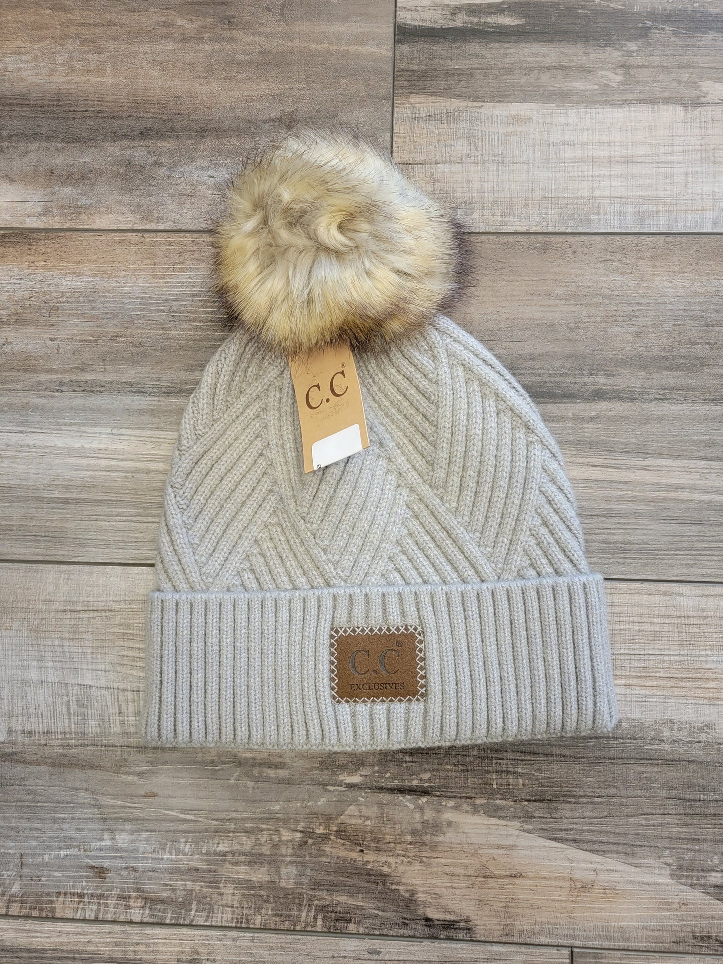 Diagonal Stripe Pom Pom Beanie