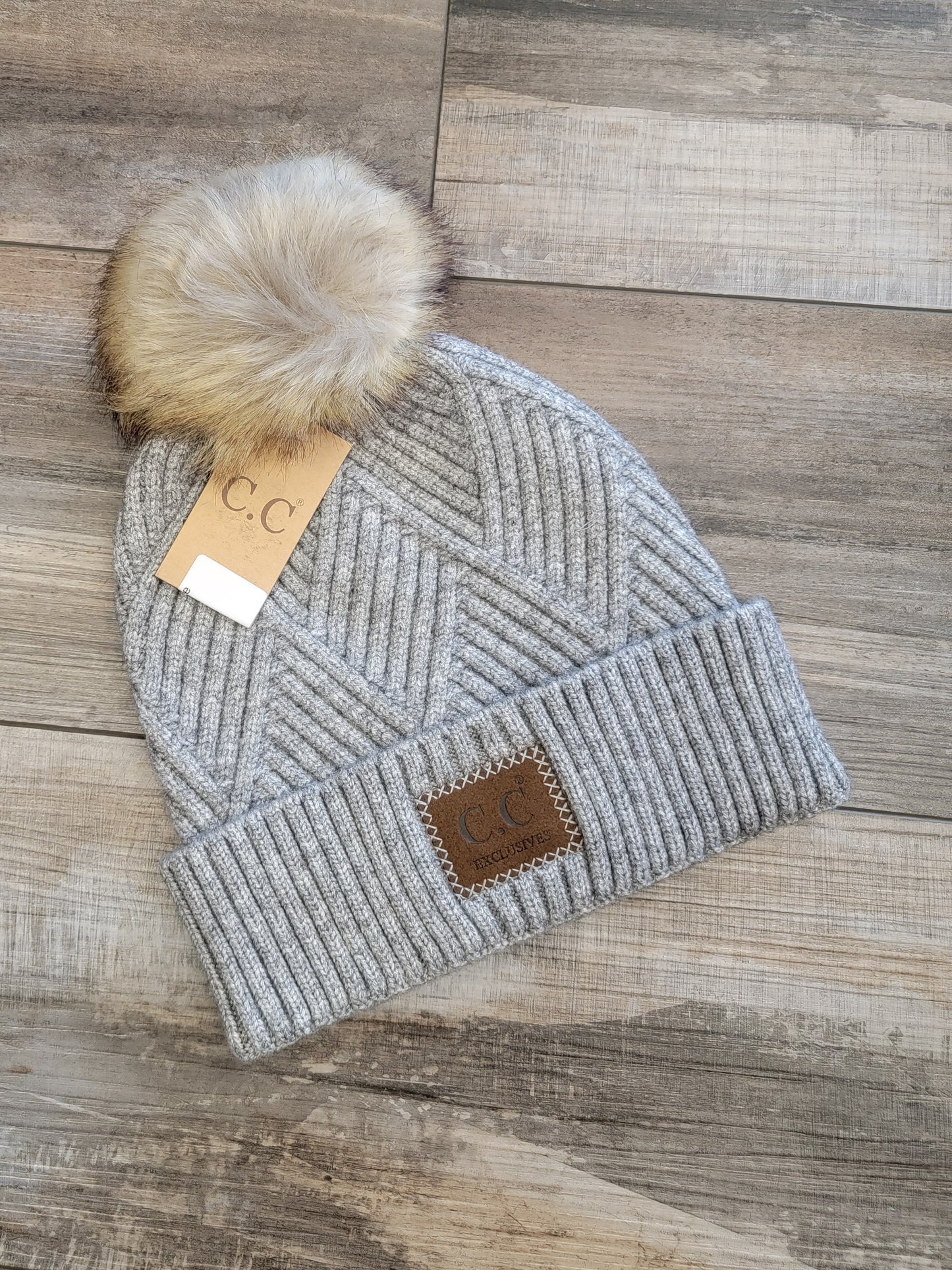 Diagonal Stripe Pom Pom Beanie