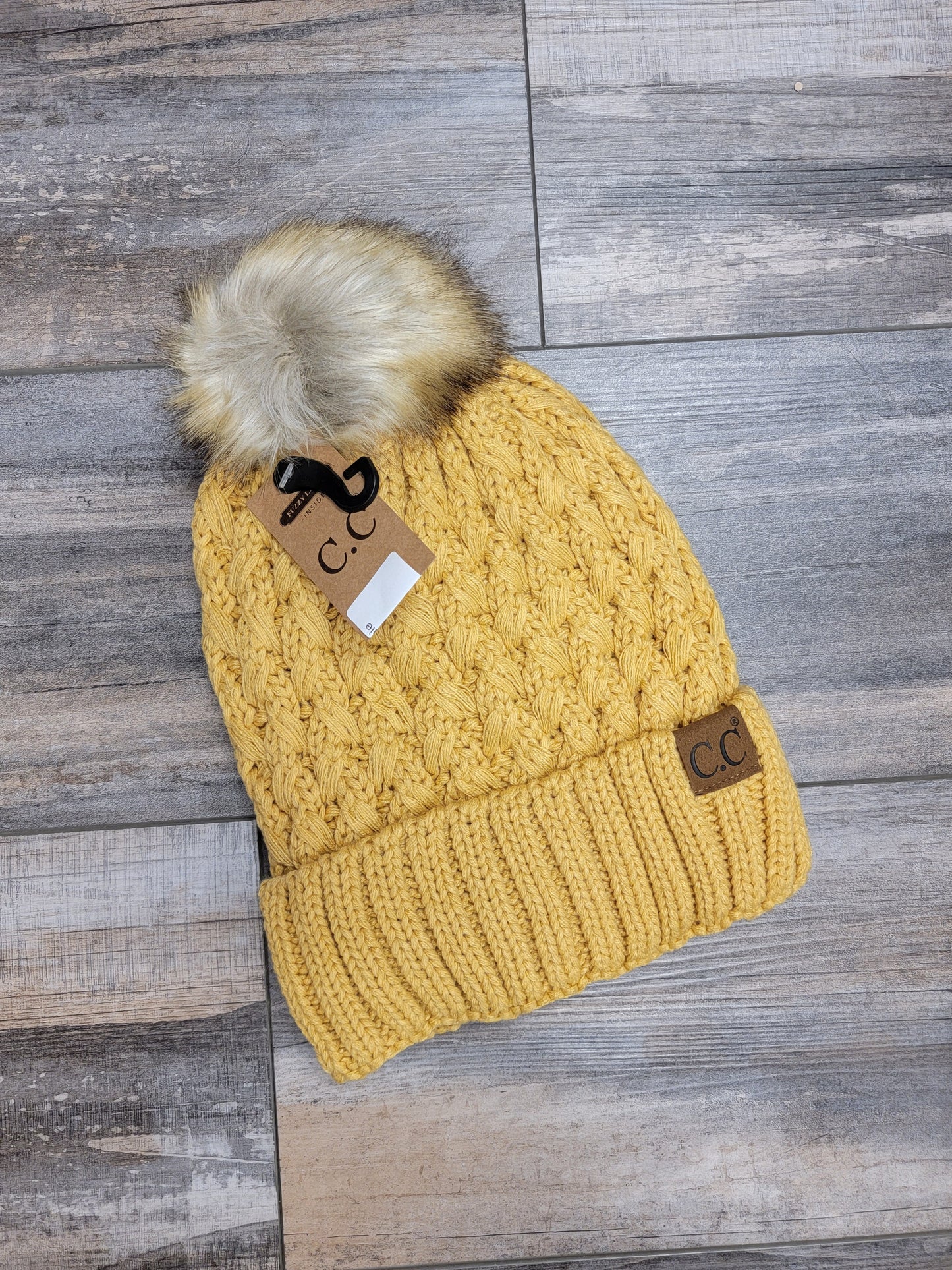 Lattice Stitch Crossover Pom Beanie