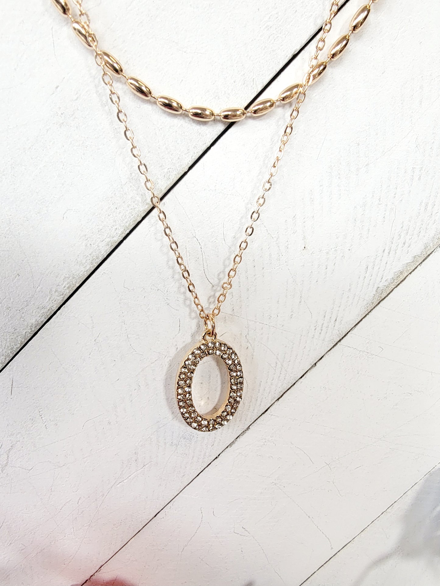 Double Layered Necklace With Oval Pendant