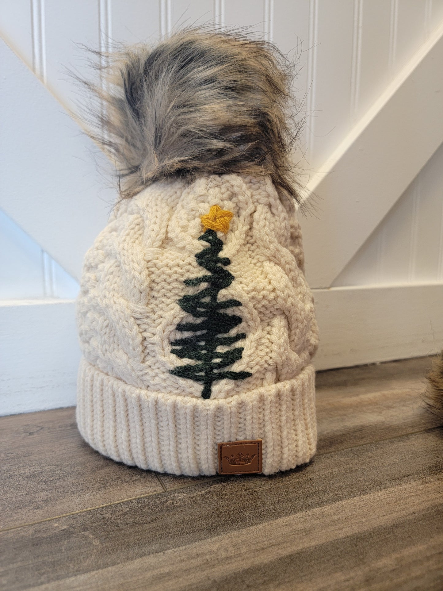 Cable Knit Pom Beanie with Embroidered Tree