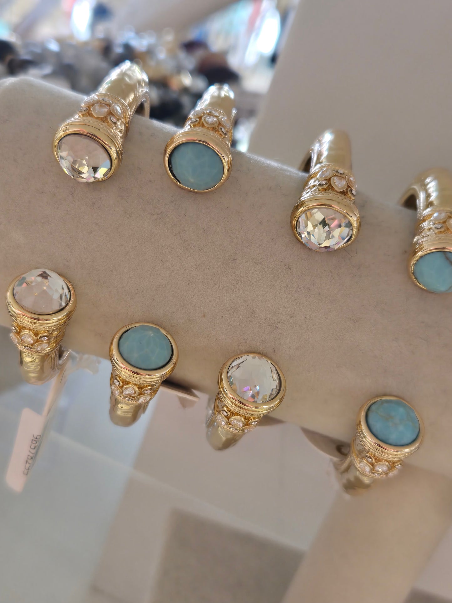Gold Metal Hinged Bracelet with Stone