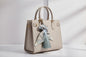 Braided Scarf and Tassell Bag Charm