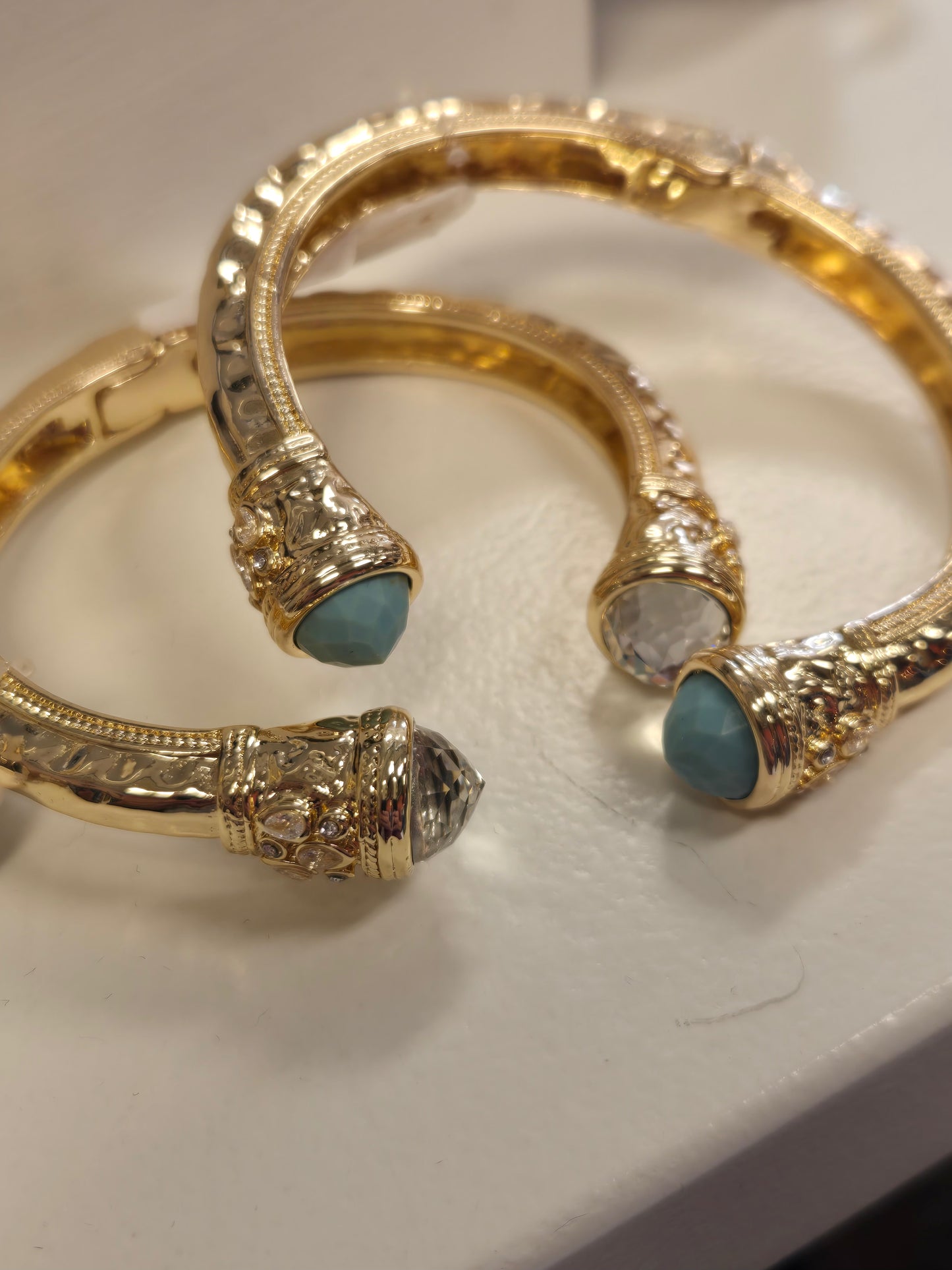 Gold Metal Hinged Bracelet with Stone